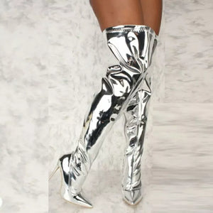 Silver thigh-high stiletto boots with a sleek, shiny finish.