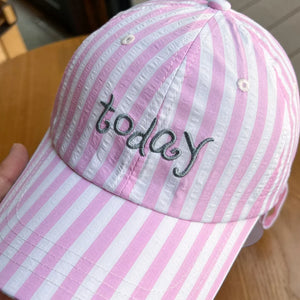 Pink and white striped cotton baseball cap with embroidered "today" text.
