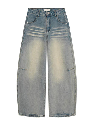 Men's vintage blue wide leg jeans with button fly and pocket details