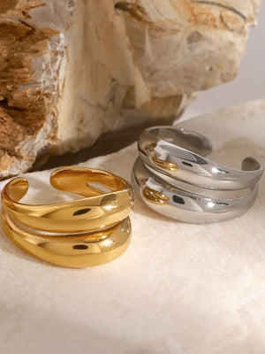 Gold and silver double band open rings with a smooth, polished finish.