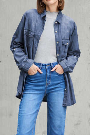 Relaxed light blue denim shirt with patch pockets and buttoned front.