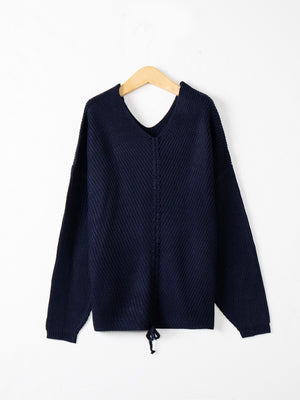 Dark Blue slouchy knit sweater with V-neck and lace-up detail at hem