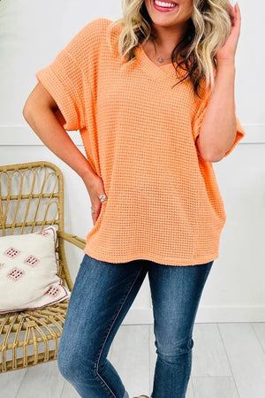 Waffle knit v-neck t-shirt in sherbet with short sleeves.