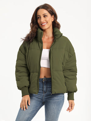 Moss green padded bomber jacket with ribbed cuffs and a high collar.