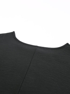 Black textured blouse with crew neck and seam detail
