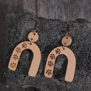 Camel paw print arch earrings with wooden material and copper hooks.