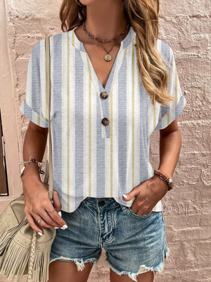 Bohemian tapestry henley blouse with blue and yellow stripes and button detail.