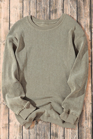 Textured ribbed crewneck pullover in Sage with long sleeves and cuffed hem.
