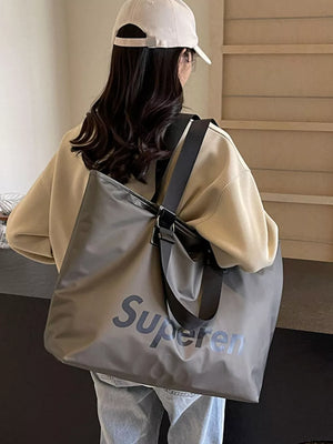 Spacious grey Oxford cloth travel shoulder bag with "Superen" logo detail.