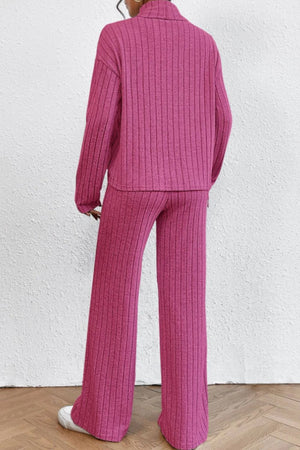 Hot Pink ribbed knit turtleneck lounge set with wide leg pants.