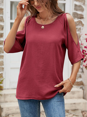 Burgundy open-shoulder textured raglan top with short sleeves.