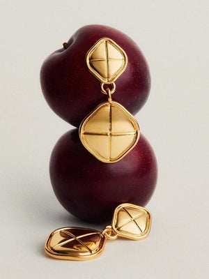 Gold sculpted geo drop earrings with cross detail, 18K gold-plated.