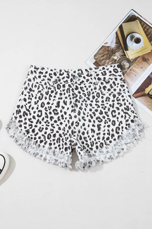 Leopard print denim shorts with frayed hem detail