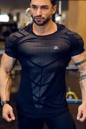 Black performance mesh sculpt tee with geometric pattern and logo detail.