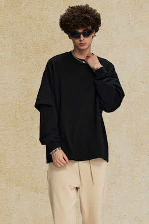 Black oversized long sleeve tee with layered sleeves and crew neck