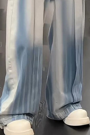 Relaxed fit ombre wide-leg jeans in blue cotton with a faded effect.