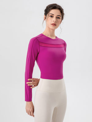 Red-violet long sleeve crop top with sheer mesh neckline detail