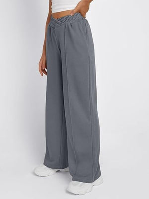 Dark Gray V-waistline palazzo sweatpants with center seams and pockets.