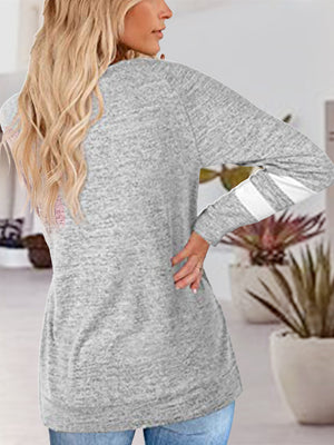Light gray raglan v-neck top with varsity stripes on sleeves and dusty pink detail on back.
