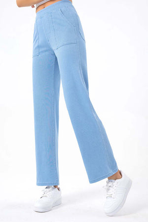 Light wash denim utility pocket straight leg jeans with elastic waistband.