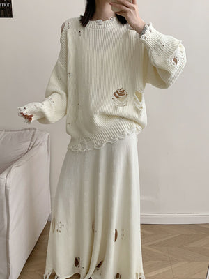Off white distressed cotton sweater set with deconstructed details and frayed hem