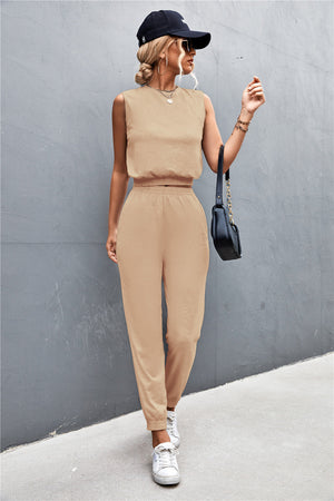 Khaki cropped muscle tank and jogger set with elastic waistbands and cuffs.
