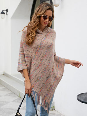 Hooded mélange cape in tan with colorful stripes and fringe detail
