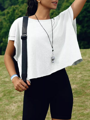White t-shirt with exposed seams and a cutout back detail.