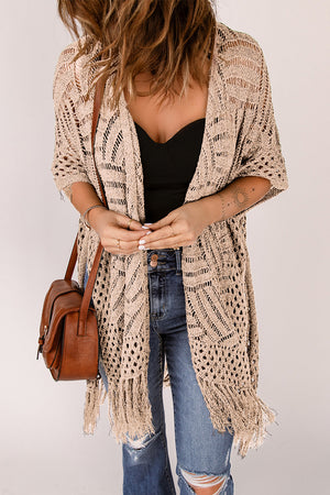 Tan open knit chevron fringe cardigan with short sleeves.