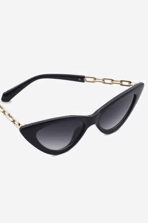 Black cat-eye sunglasses with gold chain detail on temples