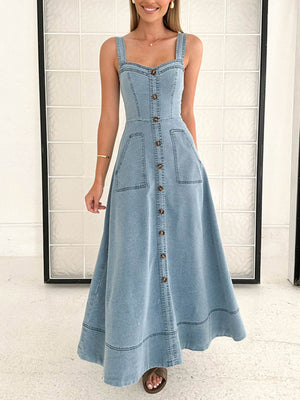 Light wash denim A-line midi dress with button front, square neckline, and patch pockets.