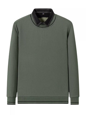 Sage ribbed knit sweater with a black collar and contrast stitching.