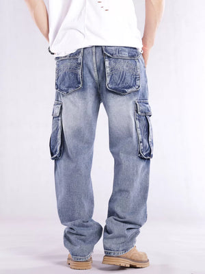 Relaxed fit light wash denim cargo jeans with flap pockets and contrast stitching.