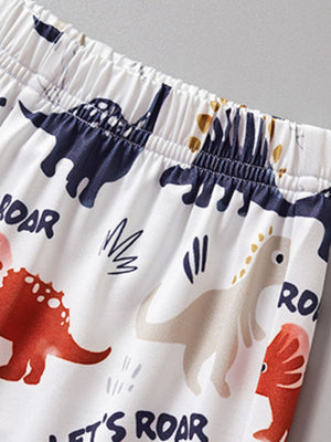 Toddler two-piece set with white background and all-over dinosaur print in navy, red, and tan.