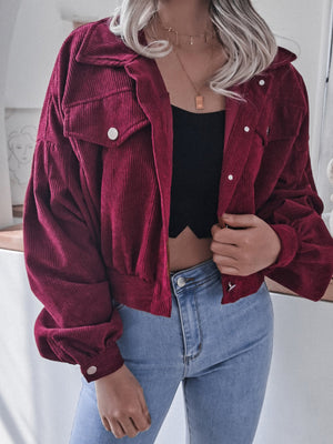 Wine corduroy cropped jacket with balloon sleeves and button-up front.