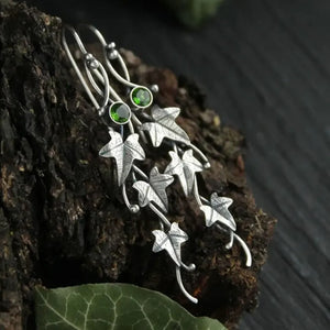 Green gemstone ivy vine drop earrings with silver alloy metal.