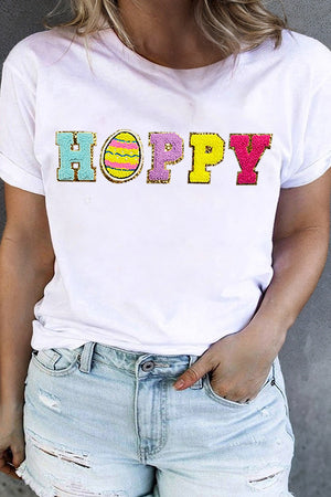 White graphic tee with sequin "Hoppy" Easter egg design