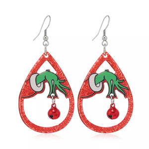 Teardrop earrings with Grinch hand design, red glitter acrylic, and dangling red bells.