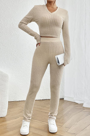 Beige ribbed knit co-ord set with v-neck crop top and fitted pants