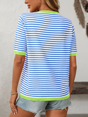 Light blue and white striped knit tee with contrast green trim and short sleeves.