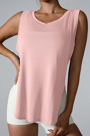 Blush pink performance tank top with asymmetric hemline and V-neck.