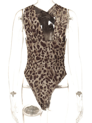 Leopard print ruched bodysuit with asymmetrical neckline and deep V-neck.