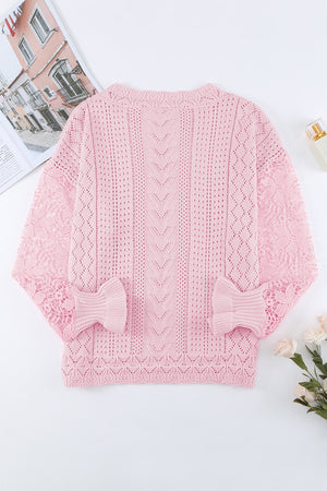 Blush pink openwork knit sweater with lace sleeves and ruffled cuffs.