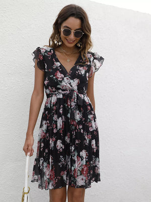Black floral pleated dress with ruffle sleeves and belted waist