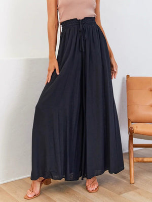 Black maternity palazzo pants with gathered drawstring waist and wide legs.