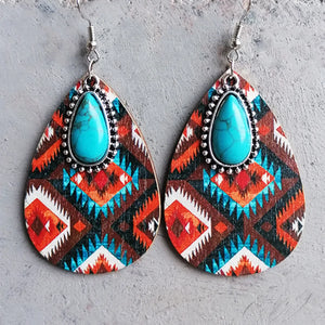Geo-Turq teardrop dangle earrings with tribal pattern and turquoise stone.