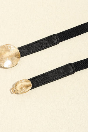 Black elastic belt with faux leather trim and gold disc detail.