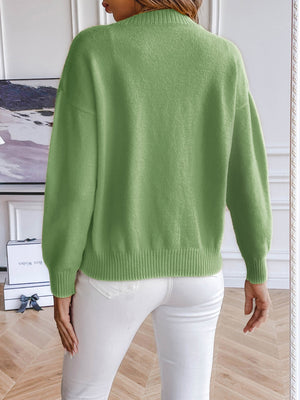 Matcha green button-down cardigan with ribbed cuffs and hem, detailed view.