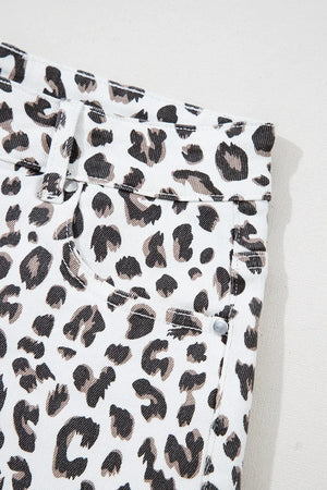 Leopard print denim shorts with frayed hem detail