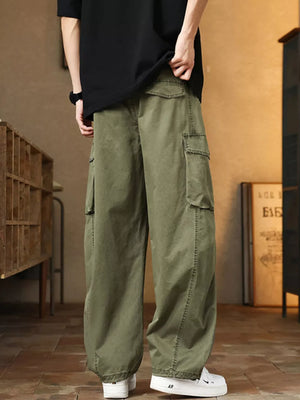 Men's green cargo pants with multiple pockets and drawstring detail